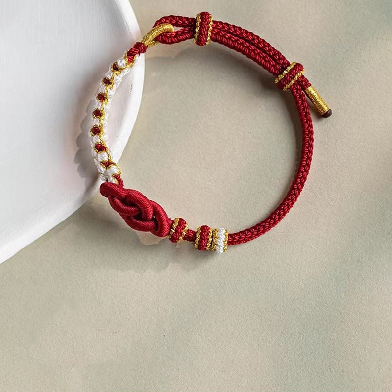 Pulsera de cuerda de la suerte con dije de flor de melocotón, nudo de amor verdadero hecho a mano con Buddha Stones