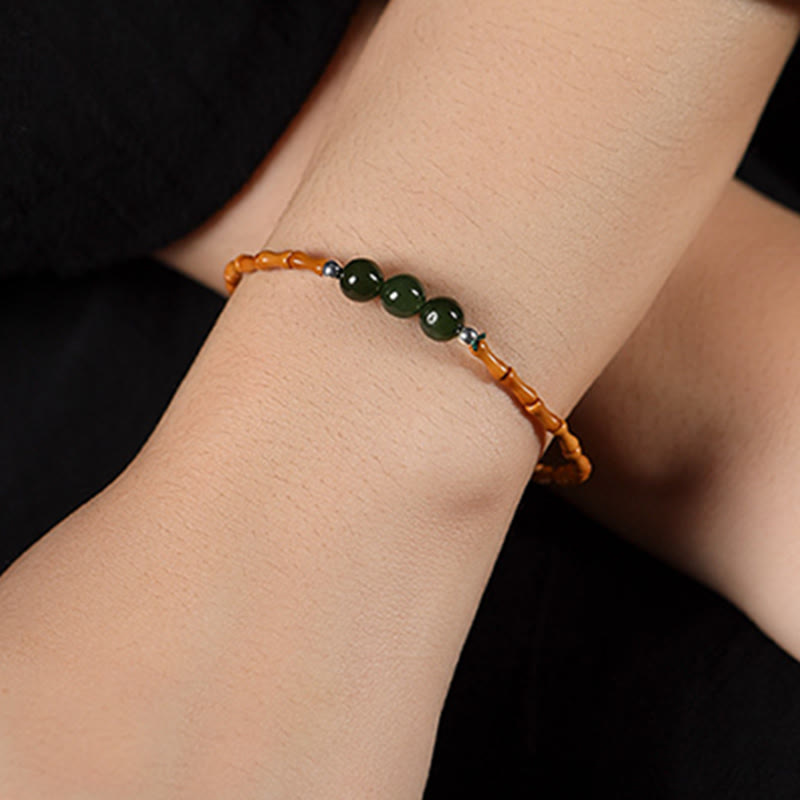 Pulsera de la suerte con cuentas de jade hetiano con patrón de bambú de oliva natural con Buddha Stones