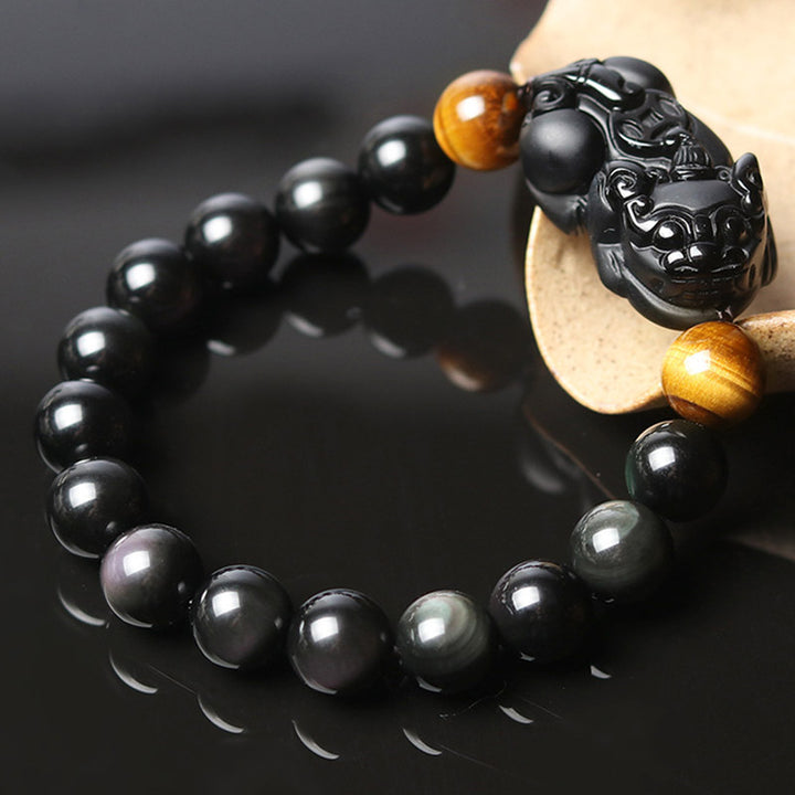 Pulsera de riqueza de ojo de tigre de obsidiana arcoíris FengShui PiXiu de Buddha Stones