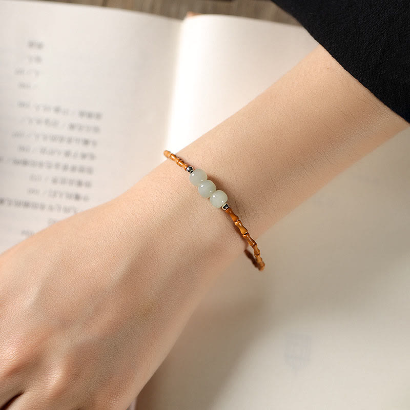 Pulsera de la suerte con cuentas de jade hetiano con patrón de bambú de oliva natural con Buddha Stones