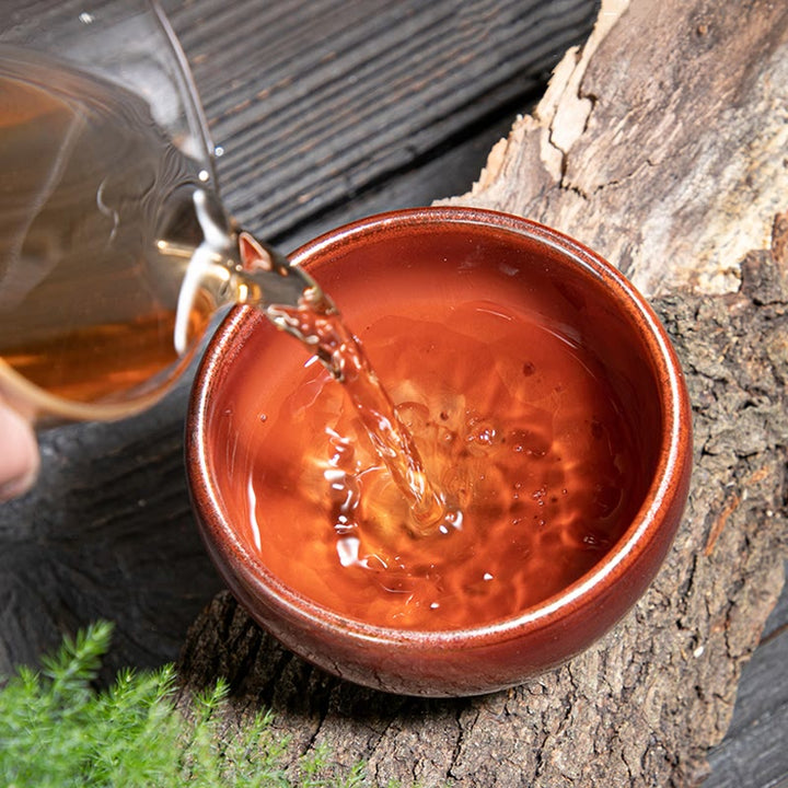 Taza de té de cerámica con diseño de loto Jianzhan chino hecho a mano con Buddha Stones , taza de té de Kung Fu