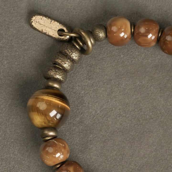 Pulsera de la suerte con Buddha Stones de Kuka, ojo de tigre, brillo dorado, obsidiana, cobre, riqueza
