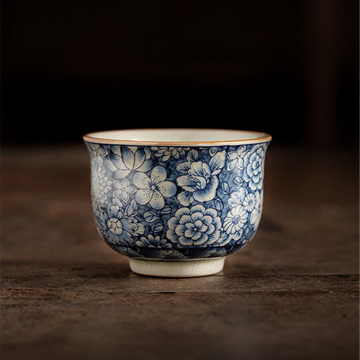 Tazas de té de cerámica de crisantemo con flor de ciruelo y peonía de loto Vintage con Buddha Stones