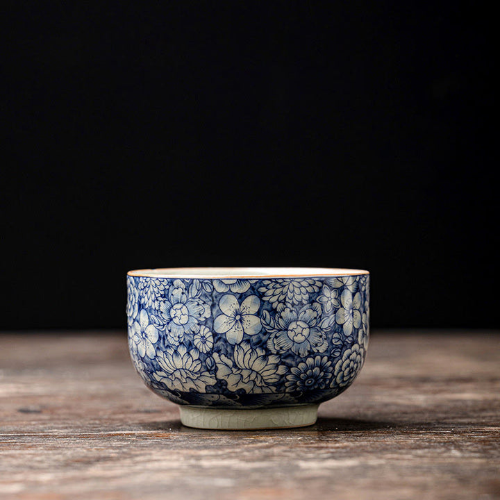 Tazas de té de cerámica de crisantemo con flor de ciruelo y peonía de loto Vintage con Buddha Stones