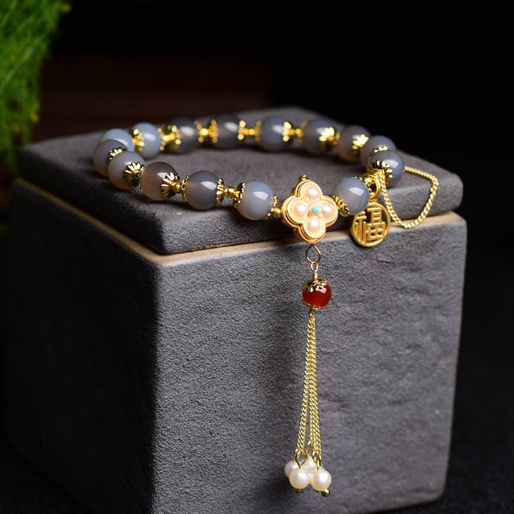 Pulsera de equilibrio con borlas y perlas de carácter Fu de ágata gris natural con Buddha Stones