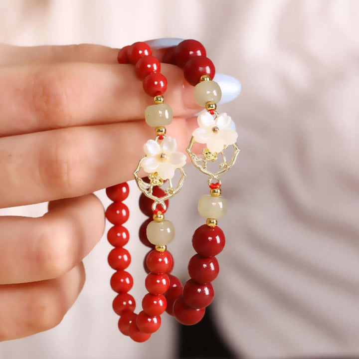 Pulsera de bendición de flores de piedra Tridacna con cuentas de jade cinabrio Natural de Buddha Stones