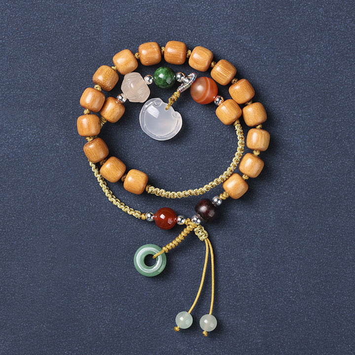 Pulsera relajante de doble vuelta con dije de hebilla de paz y calcedonia de sándalo verde con Buddha Stones