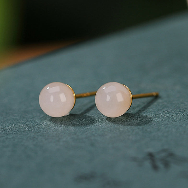 Pendientes de tuerca con bendición de jade blanco redondo de plata de ley 925 con Buddha Stones