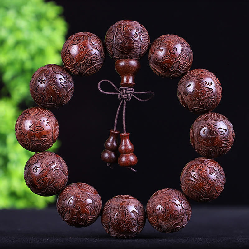 Pulsera de calidez tallada con monedas de cobre, ébano y palisandro del zodiaco chino con Buddha Stones y Pixiu