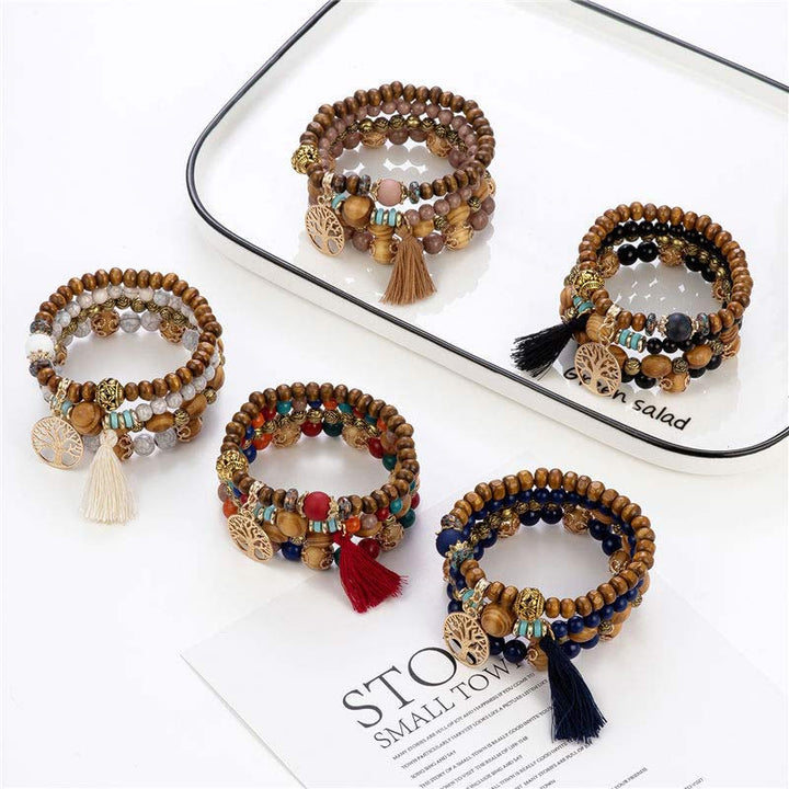 Pulsera curativa con borlas de árbol en capas de madera de wengué