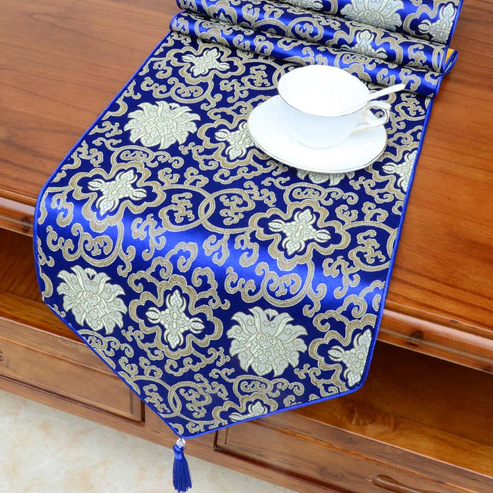 Camino de mesa Jacquard con borlas y símbolos propicios tibetanos con diseño de dragón Vajra y flores de altar de oración