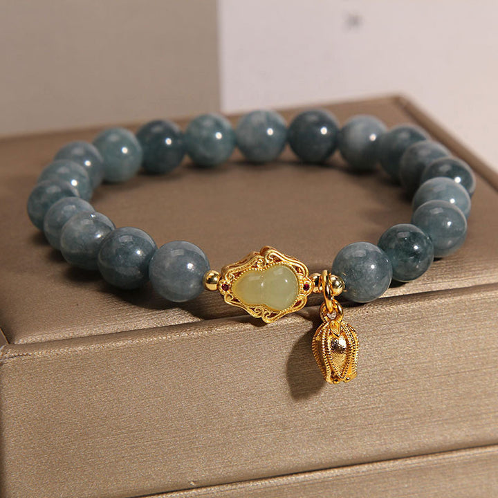 Pulsera de la suerte con dije de tulipán y calabaza de jade natural con Buddha Stones