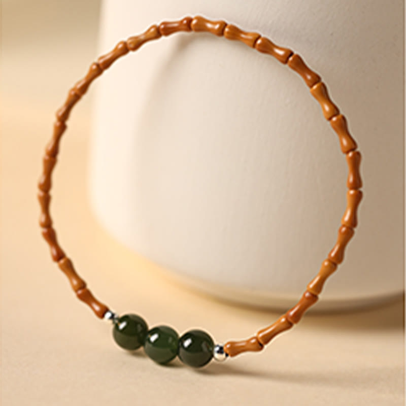 Pulsera de la suerte con cuentas de jade hetiano con patrón de bambú de oliva natural con Buddha Stones