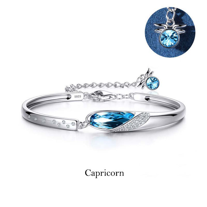 Pulsera con dijes de las 12 constelaciones del zodíaco de cobre bañado en plata 925 con Buddha Stones