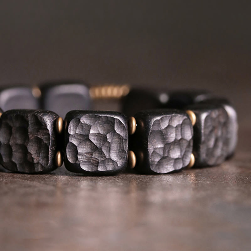 Pulsera de equilibrio de paz de cobre estilo textura de madera de ébano retro con Buddha Stones