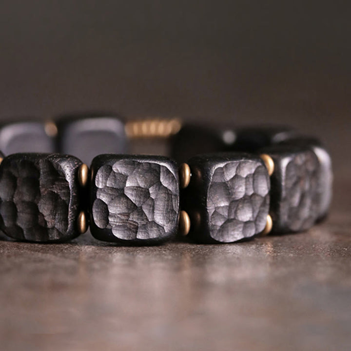 Pulsera de equilibrio de paz de cobre estilo textura de madera de ébano retro con Buddha Stones