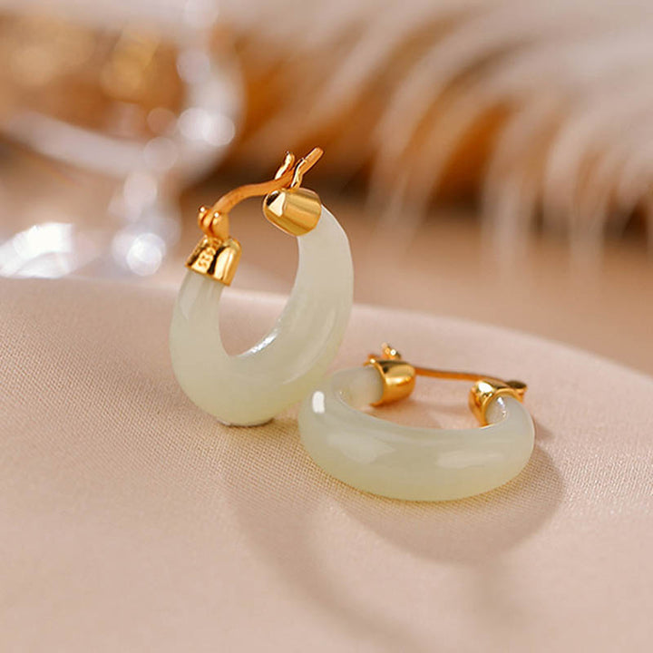 Pendientes colgantes de suerte de prosperidad de jade cian redondo de Buddha Stones
