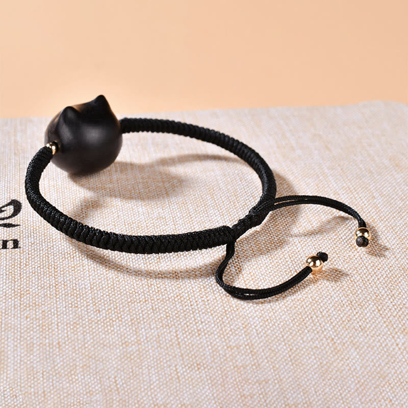 Pulsera trenzada con nudo de King Kong de la paz con patrón de cabeza de gato de madera de ébano con Buddha Stones - image 17