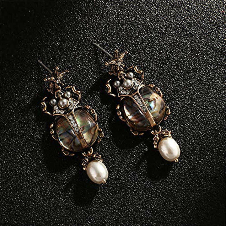 Pendientes colgantes con forma de calavera y escarabajo, estilo vintage, con perlas de cristal y escarabajo