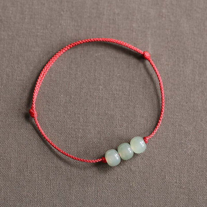 Pulsera de tejido de hilo de la suerte de jade con tres cuentas de piedras de Buddha Stones