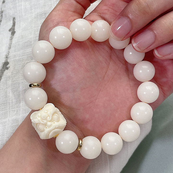 Pulsera de protección con Buddha Stones, obsidiana con brillo plateado, semilla de Bodhi, marfil, fruta, león danzante