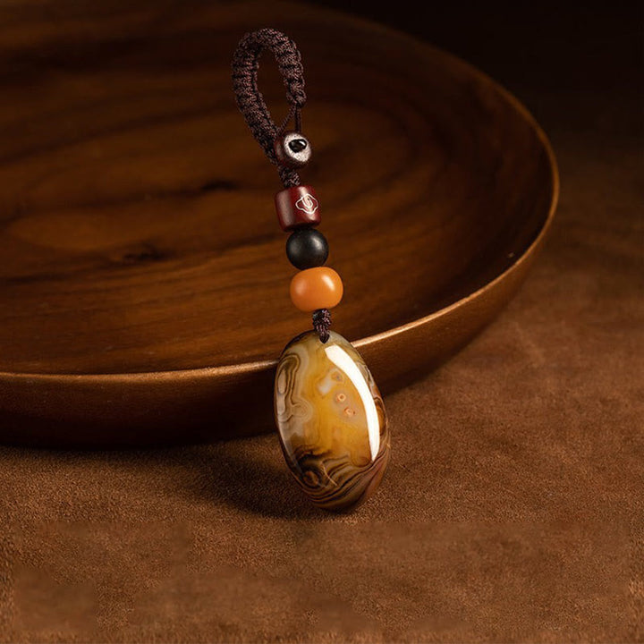 Llavero positivo con piedra Sardonyx aleatoria de Buddha Stones