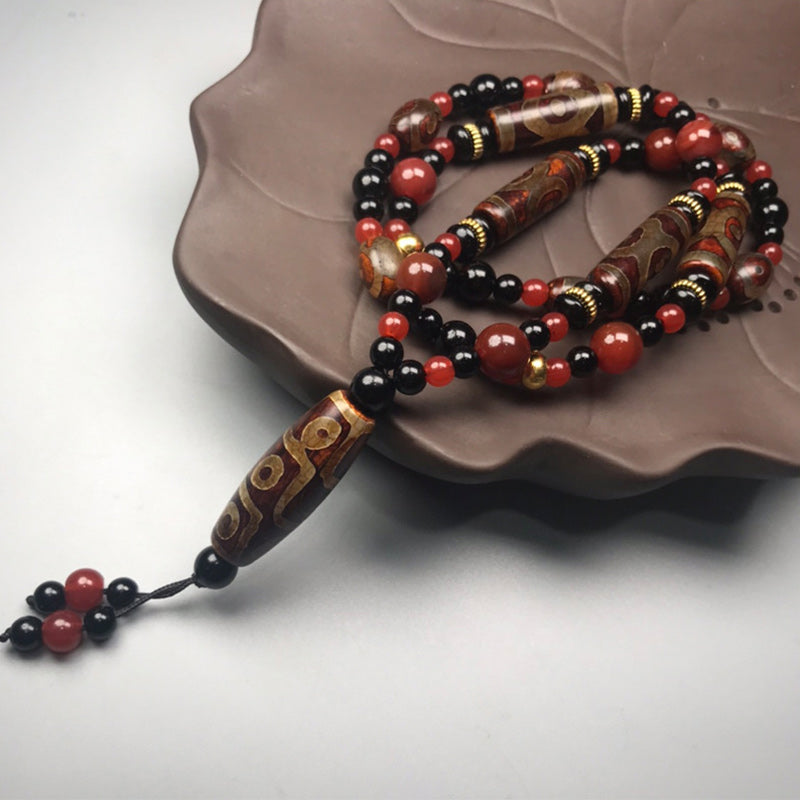 Collar de salud y riqueza con Buddha Stones Dzi de nueve ojos, ágata roja