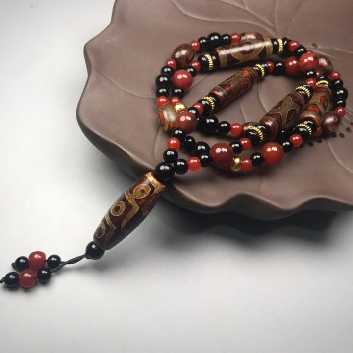 Collar de salud y riqueza con Buddha Stones Dzi de nueve ojos, ágata roja