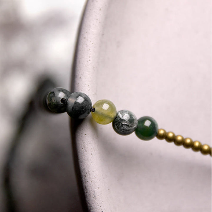 Pulsera multicapa de la suerte de cobre con ágata musgosa y Buddha Stones