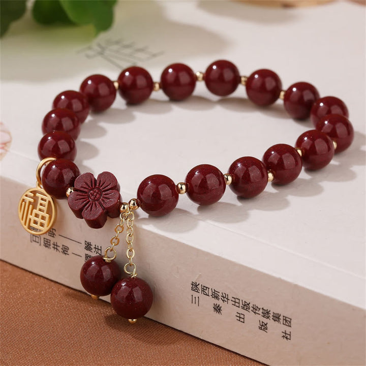 Pulsera de bendición de flor de cerezo con personaje de cinabrio Fu de Buddha Stones