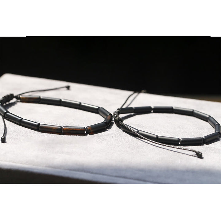 Pulsera de protección de soporte de cuentas de ónix negro con Buddha Stones