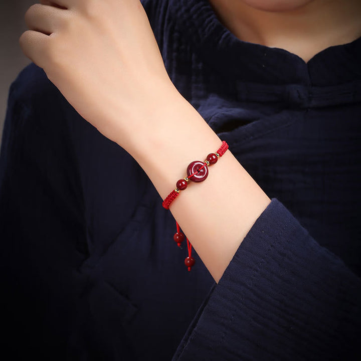 Pulsera de cuerda de bendición con hebilla de paz de cinabrio natural con Buddha Stones