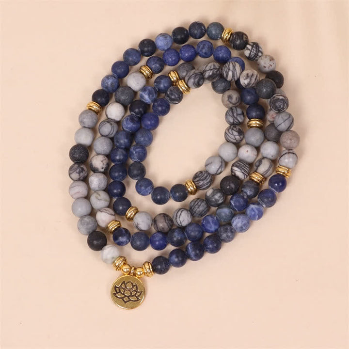 Pulsera de fuerza de loto con Buddha Stones, 108 cuentas de Mala, sodalita, cebra, jaspe, cristal