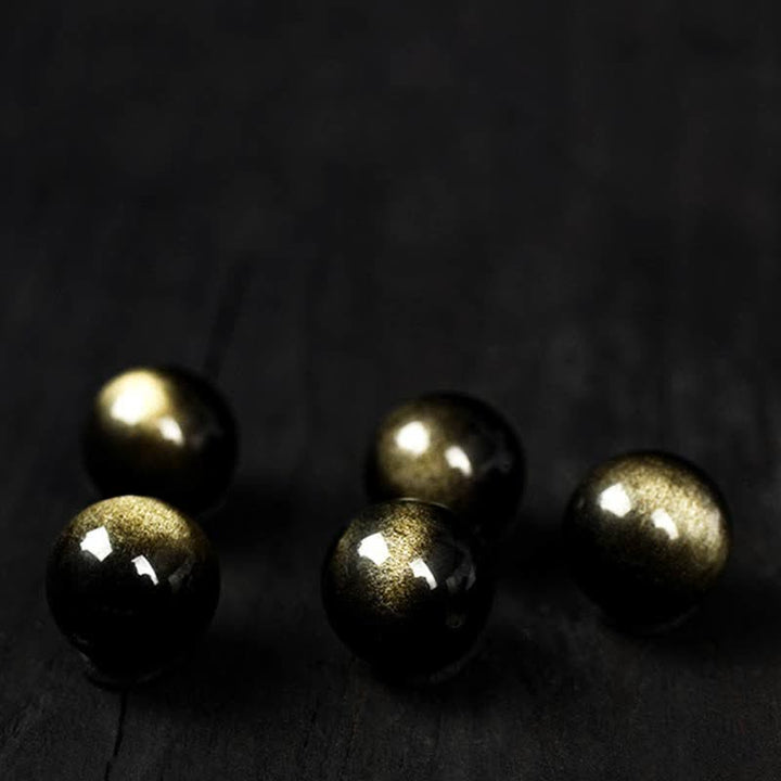 Buddha Stones para experimentar una inversión de la fortuna Pulsera de protección de obsidiana con brillo dorado de obsidiana arcoíris