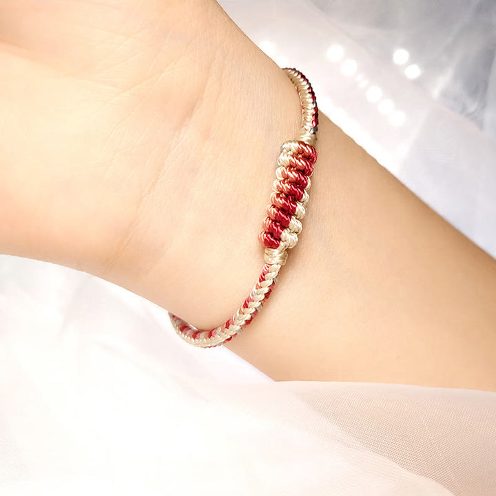 Pulsera de protección trenzada con rueda de oración, nudo de la paz, hecho a mano, con Buddha Stones tibetanas