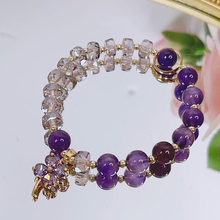 Pulsera con dijes curativos de trébol de cuatro hojas con cristales de amatista y Buddha Stones