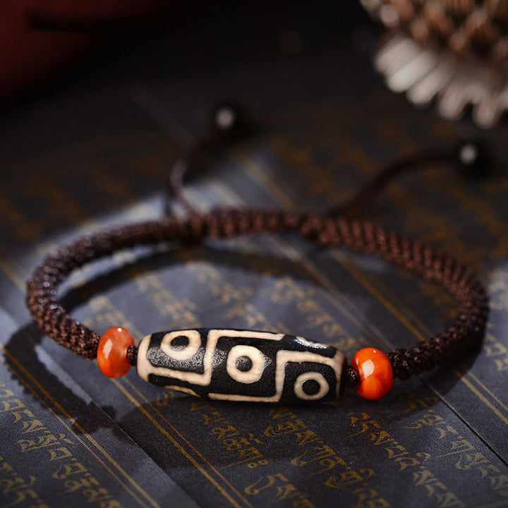 Pulsera de hilo de prosperidad con cuentas Dzi tibetanas de nueve ojos con Buddha Stones