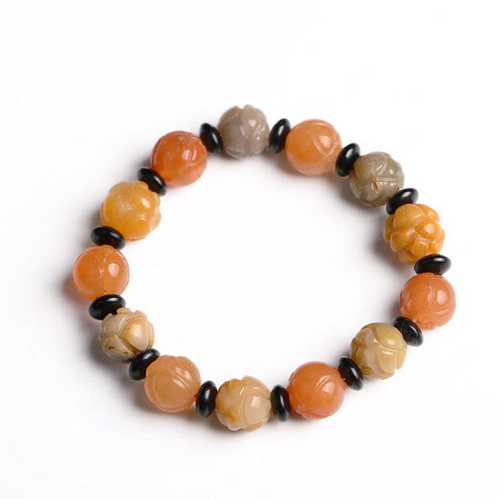 Pulsera de suerte y riqueza de loto de jade de seda dorada