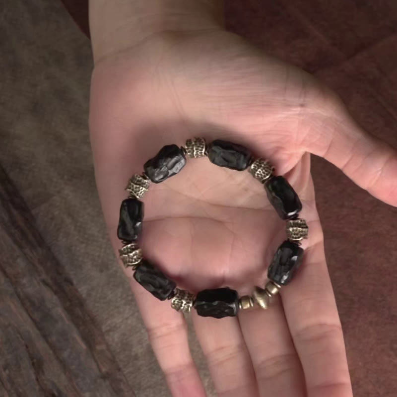 Pulsera de paz tranquila de cobre y madera de ébano tibetano con Buddha Stones