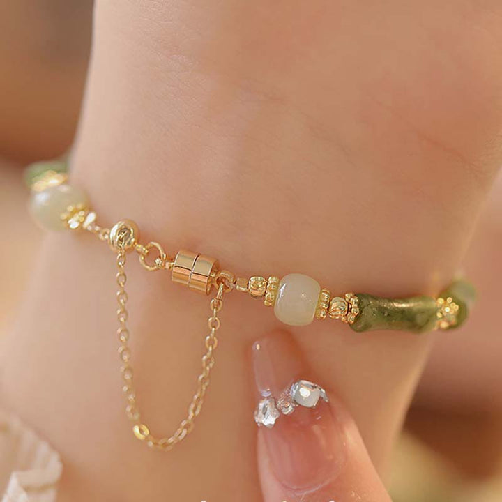 Pulsera de la abundancia de la suerte del patrón del lirio de los valles de la hoja de bambú del jade de las Buddha Stones