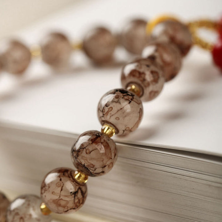 Pulsera de armonía con cuentas de cristal Liuli de Buddha Stones