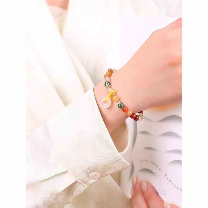 Pulsera de riqueza con hebilla de paz de jade de seda dorada colorida chapada en oro de 14 Buddha Stones
