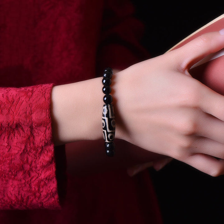 Pulsera de poder de riqueza con cuentas Dzi de nueve ojos naturales tibetanas de Buddha Stones