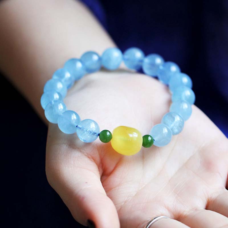 Pulsera curativa de serenidad con cuentas de ámbar y aguamarina natural