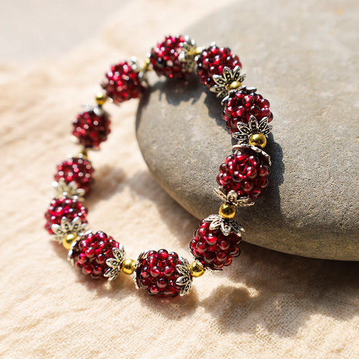 Pulsera curativa de granate natural con Buddha Stones