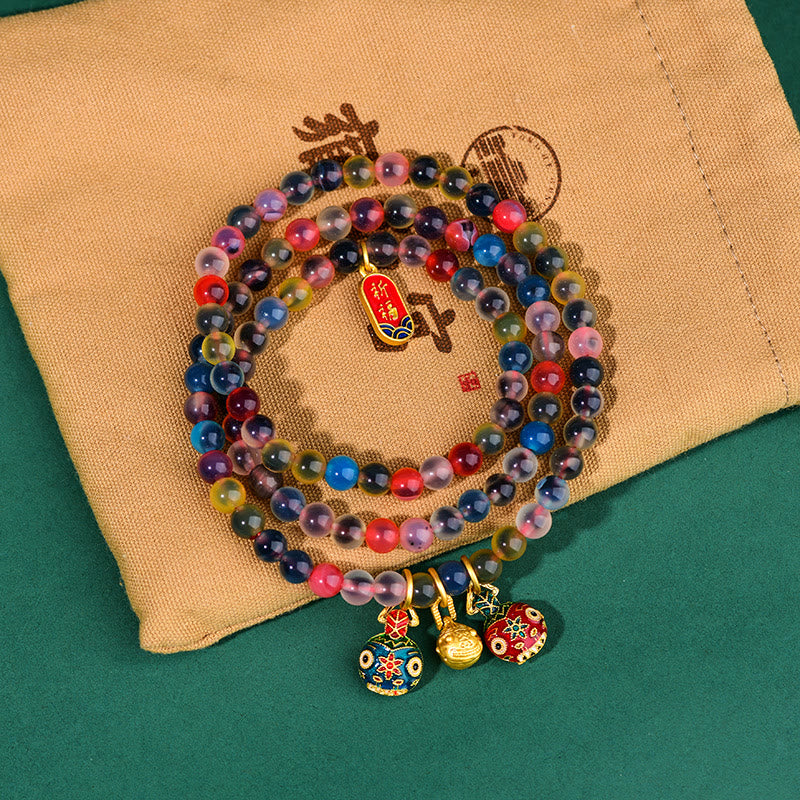 Pulsera de triple envoltura con dije de fuerza familiar de bestia tragadora de oro con ágata de caramelo colorida y Buddha Stones