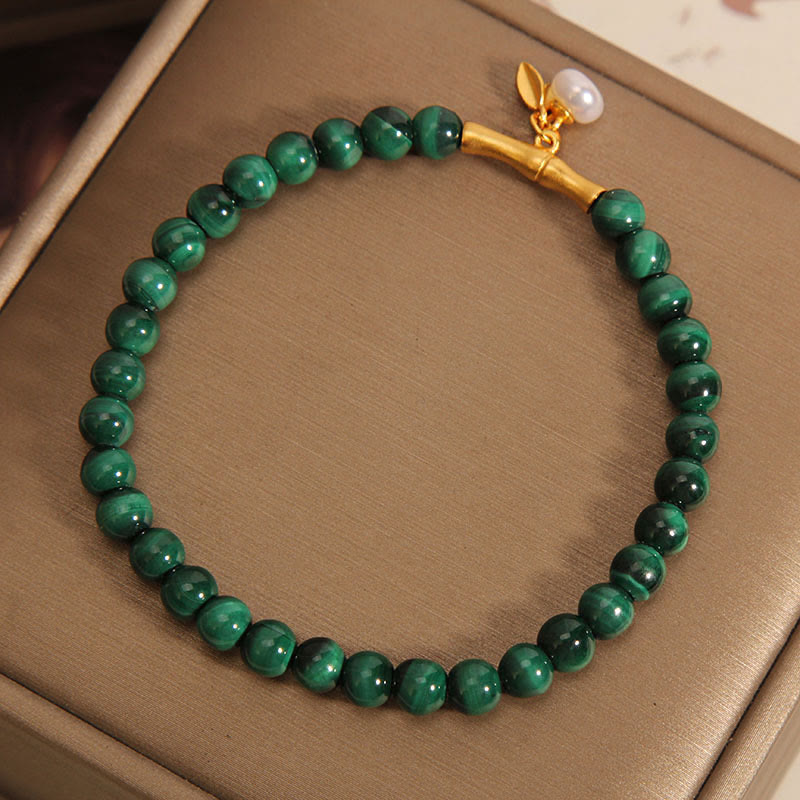 Pulsera antiansiedad de bambú de la suerte con perlas de malaquita natural de Buddha Stones
