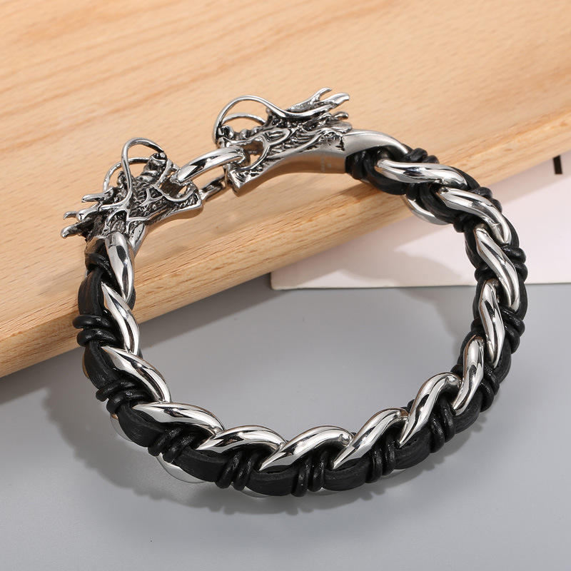 Pulsera trenzada de la suerte con protección de acero titanio y cuero de dragón