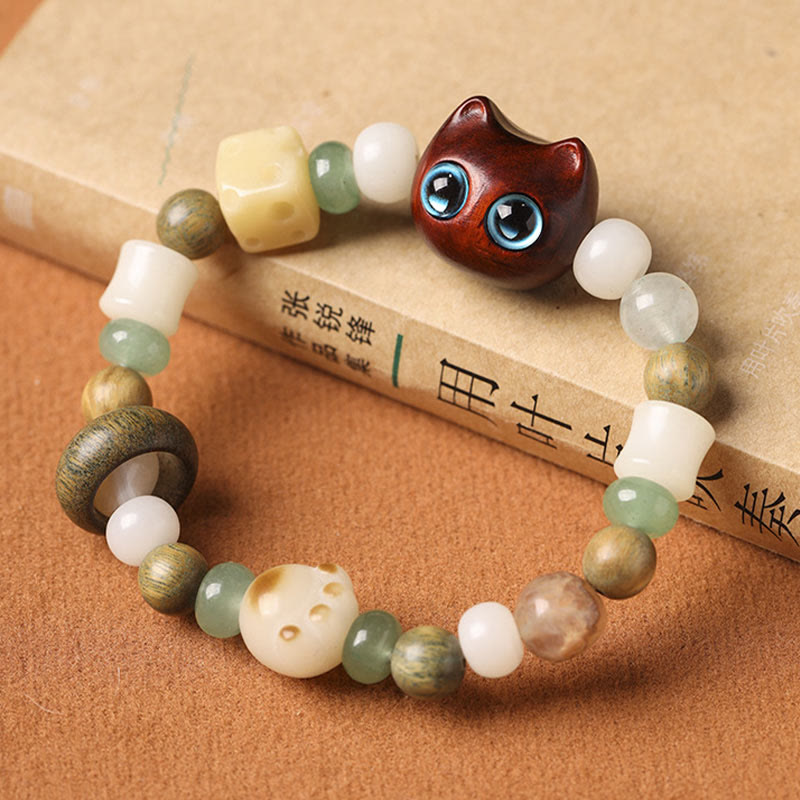 Buddha Stones, semillas de Bodhi, sándalo verde, madera de ébano, hoja pequeña, sándalo rojo, cabeza de gato, garra de pata, pulsera de la paz - image 11