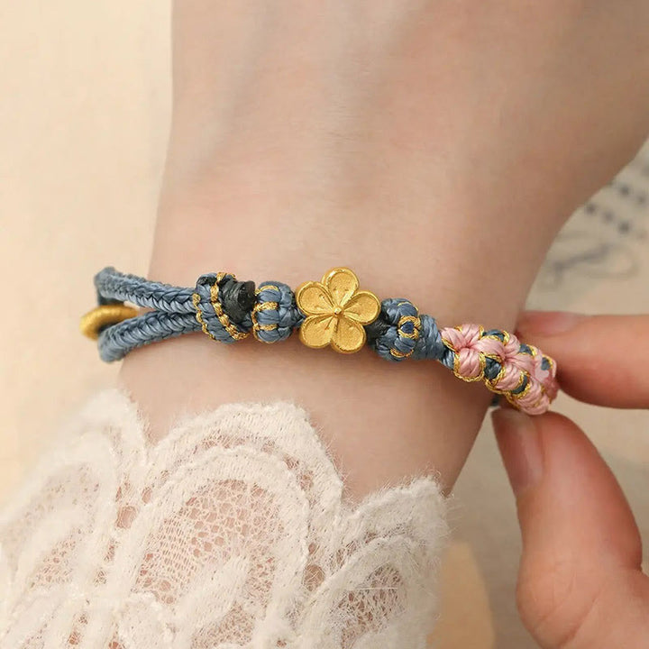 Pulsera de hilo de riqueza con diseño de flor de durazno